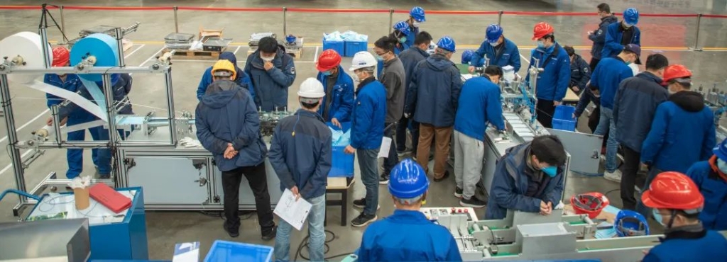 ezweb易利娱乐平台智能首台口罩机交付客户